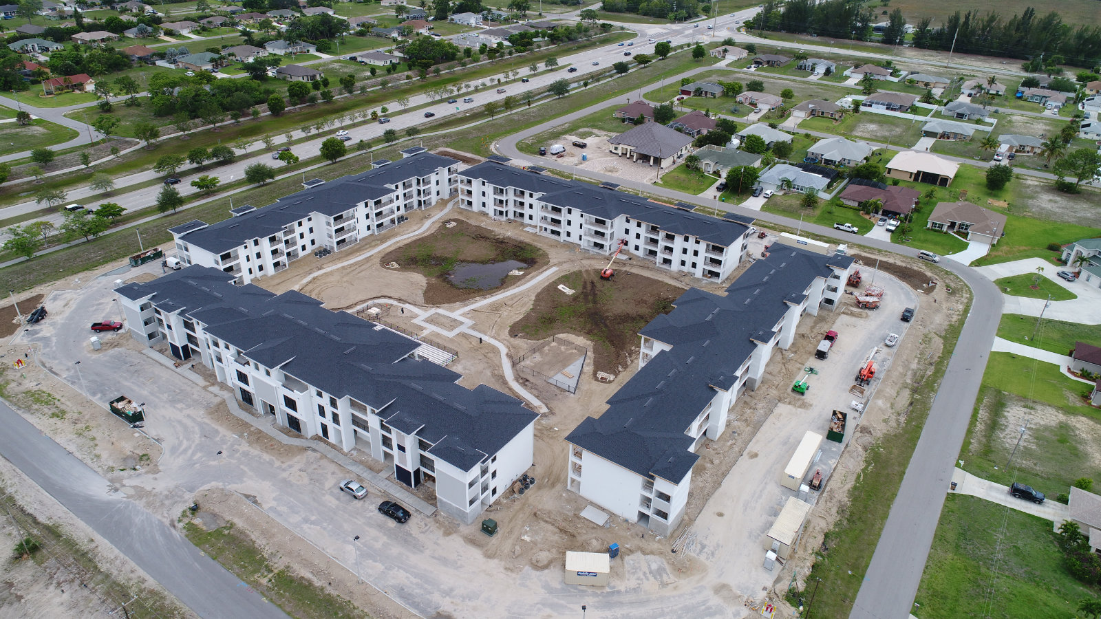 Construction progress drone photography Upstate NY building site aerial view