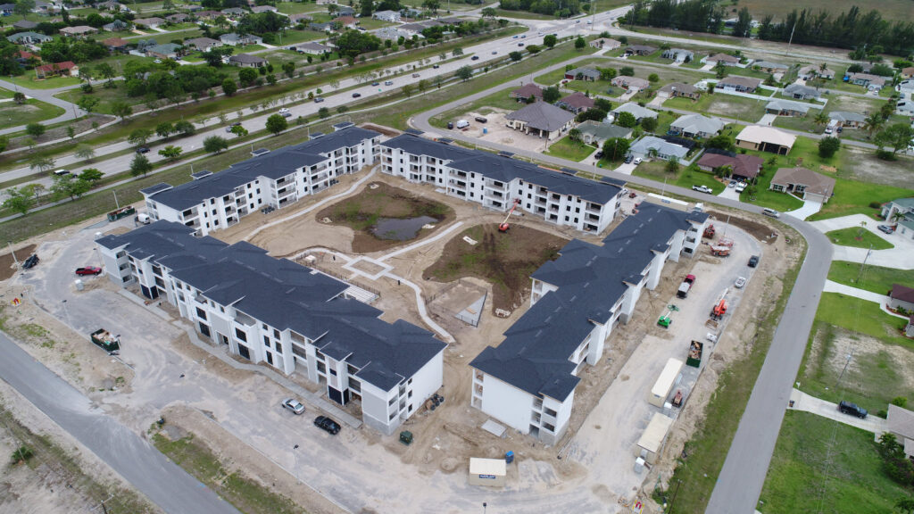 Construction progress drone photography Upstate NY building site aerial view